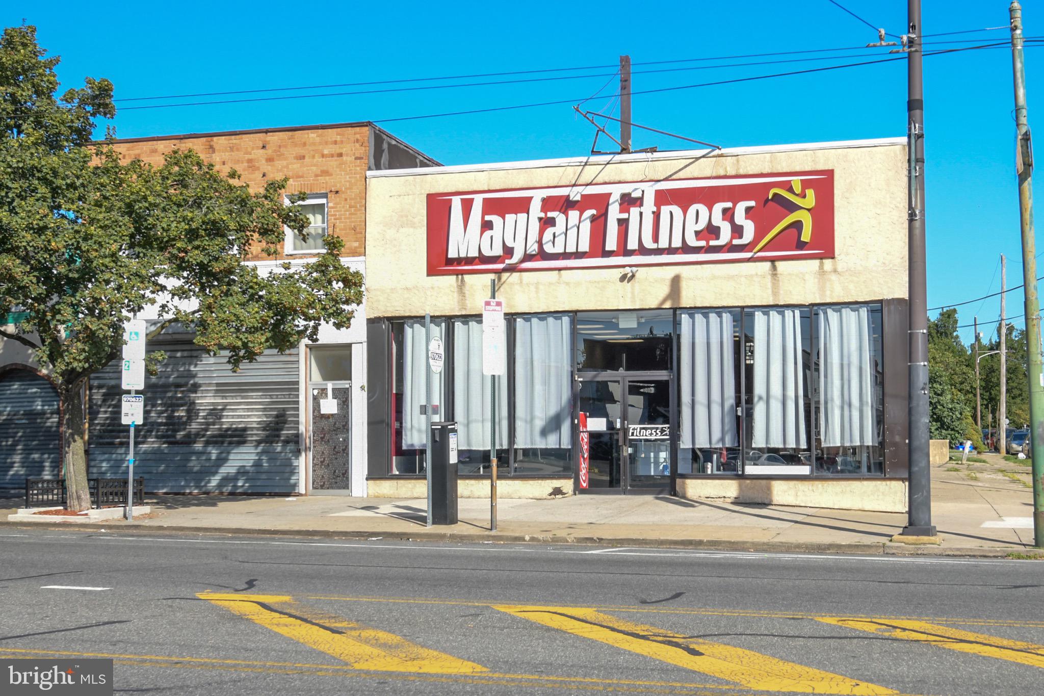 Rare investment opportunity to acquire Mayfair Fitness, a fully operational fitness center offered together with the prime commercial real estate it occupies in the heart of Mayfair, Philadelphia. This turnkey investment blends a well-established business with consistent membership revenue and the long-term security of property ownership. The facility features a full lineup of cardio and strength equipment, locker rooms, showers, and spacious training areas, all included in the sale. Multiple revenue streams exist through memberships, personal training, and group fitness classes, with expansion potential into wellness services or boutique fitness concepts. The real estate itself offers excellent visibility, strong street presence, and a flexible layout adaptable to various uses. Located in a thriving, high-traffic corridor with strong neighborhood demographics, this offering provides immediate income, long-term appreciation, and multiple exit strategies for investors, developers, or owner-operators.