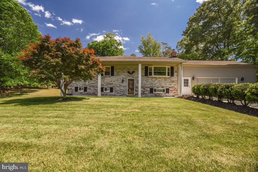 This property offers an exceptional blend of indoor comfort and outdoor enjoyment. The eat-in kitchen features breakfast bar seating, wood cabinetry, a separate island for meal prep, recessed lighting, stainless steel appliances, and an attractive tile backsplash. The kitchen opens directly to the back deck, creating a seamless transition to outdoor living and providing convenient access to the backyard and pool area.

The home also includes a very large basement with abundant space for entertaining, recreation, hobbies, or flexible use to suit a variety of needs.

Outdoor amenities truly set this property apart. The backyard provides a fantastic setting for relaxing or hosting gatherings, complete with a spacious patio that is ideal for entertaining. An in-ground pool offers a refreshing centerpiece for warm-weather enjoyment, and the pool area is fenced to provide added privacy. The yard is generously sized and also offers room for gardening or additional outdoor activities.

A rear addition expands the property’s functionality and includes an oversized garage designed for both vehicle storage and gathering space, offering versatility beyond traditional parking. With multiple areas designed for entertaining and outdoor enjoyment, this property delivers a well-rounded living experience with thoughtful features throughout. Select photos are virtually staged.