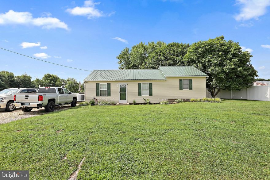 Don't miss out on this updated rancher located on a beautiful 1 acre lot.  New doors and freshly painted through out. Newly finished porch with new windows and flooring. Huge new kitchen pantry. Enjoy the beautiful sunsets and relax on the 16' X19' deck. Brand new 20'x36' pole barn. High ceilings and LED lighting through out. New 10' x 12' storage shed. Brand new 200' long 6' high privacy fence. This home has it ALL.