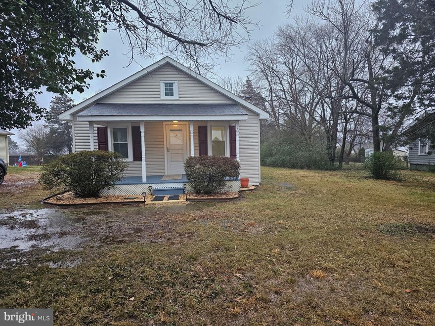 Great opportunity to own rather than rent.  NO HOA!!!!  14,888 sq ft LOT per Sept 13, 2017 survey.   Lovely home with many recent updates.  January 2023 new carpet, new luxury vinyl plank flooring and freshly painted.   January 2023 all electrical has been checked by a licensed electrician and corrections made.  January 2023 new bath commode installed.  New siding and windows replaced 2019.  Roof replaced less than 10 years.  Landscaping stone and pavers installed January 2023.   Septic pumped 8/8/2023.  Enter the home to the living room with double windows and newly installed carpet.  Two main level bedrooms with newly installed carpeting as well.  A bonus room with newly installed carpeting that can be used as an office/den/small sleeping area or large walk-in storage.  Main level laundry room/mud room with washer/dryer hook up.   Very large eat-in kitchen with newly installed luxury vinyl plank flooring.   A screened in porch off of the mud room includes a separate storage room.  Large flat rear yard perfect for a future garage or out buildings.   Minutes to I95,  park and ride commuter lots and Virginia Rail Express.  Walking distance to major shopping including restaurants, grocery, banking and BJ's.  Short drive the Central Park with many retail, restaurants, Target, Walmart, Best Buy, Spotsylvania Town Center with restaurants, retail, Costco, Paragon movie theatre and more .  Also minutes to Old Town Fredericksburg with historic landmarks and many more shopping opportunities. *****NOTE:  COUNTY HAS NO RECORD OF HOME AGE.