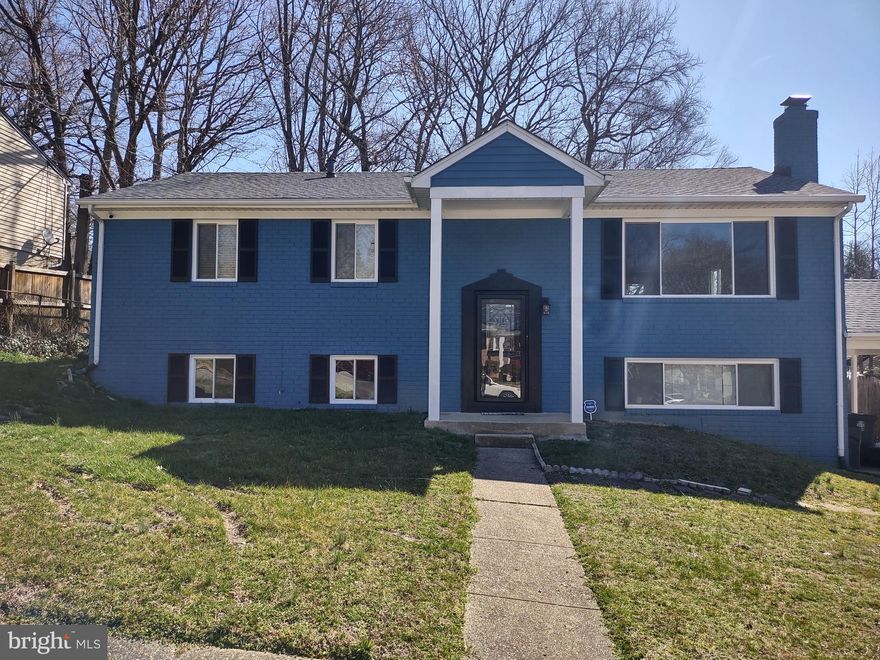 WOW come see this gorgeous move-in ready home with 5 bedrooms and 3 bathrooms!   Recently renovated with stunning improvements throughout.  Stainless appliances, wood flooring, granite counters, ceramic tile, two kitchens (one on each level), fireplace, washer/dryer, driveway for multiple cars, generous backyard with privacy, plenty of storage, and more.