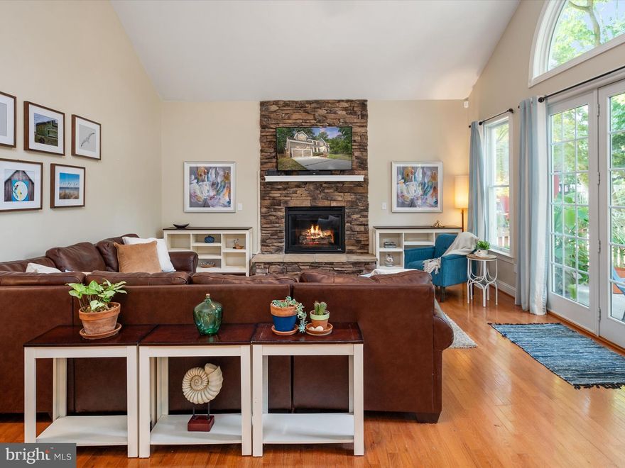 Reduced for smart buyer lucky to own this classy value packed Colonial!  Annapolis Roads Newer Proud Colonial with new front portico for a polished proud presentation and your offer. Step into the grand foyer and view the large living area and formal dining areas with high 10- foot ceilings, recessed lights, oversized moldings, and trim with an office or 5th bedroom on the other side.  The  Gourmet kitchen has 42" dark cafe cabinetry for tons of storage, a huge center island with cooktop and double ovens, microwave, double sink and 2018 stainless steel appliances, Corian counters, generous pantry, wainscoting and decorative backsplash. The hall behind the kitchen for a smart entertaining floorplan boasts beautiful wainscoting and trim. The great kitchen also has a nice-sized breakfast nook with plenty of room for a table and opens to a family room framed by a custom stone propane gas fireplace, Palladium Window, and sliders to a great deck. The entire backyard is fenced with a gate to 30 acres of Key School's athletic fields with walking and exercise trails. Easy mature landscaping offers sun and shade. 
Upstairs you will find 2 good size bedrooms that share a full bath, a third bedroom that has its private bath, and what a primary bedroom retreat for four true bedrooms upstairs! The primary features a tray ceiling over the bed area, an additional work-out or lounging room, his and her walk-in closets, a huge bath with a toilet closet and shower, a big soaking tub with air jets perched under the window, and double sinks. 
The lower level is unfinished but has a rough-in for a full bath and has an exit staircase and lots of room for customization for your dream space.
Annapolis Roads has its incredible beach, picnic, and playground areas, boat ramp,  and water toy storage paid through your tax bill for affordable vacation living. Check out the map to get to them in the photo section. Public sewer, dual zone heat pumps, owned water conditioner, and newer water heater. Seller would love quick close and rent back to find home or time to find one to coincide closing.