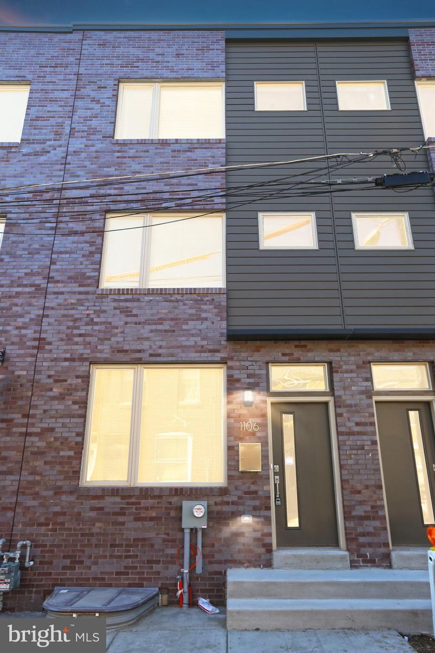 Available Starting July 1, 2025
Exceptional 3-Bedroom Townhome in the Heart of Fishtown with Roof Deck, Gated Parking & Luxury Finishes

Key Features:

    Living Space: 2,300 sq ft of modern, open-concept design
    Bedrooms/Bathrooms: 3 spacious bedrooms, 2.5 baths, plus flexible bonus space
    Parking: 1 privately gated oversized parking space — easily fits 2 vehicles
    Outdoor Living: Expansive roof deck with unobstructed skyline views
    Basement: Fully finished for additional living, office, or recreation space
    Flooring: Hardwood throughout entire home
    Security: Equipped with full security system
    Laundry: In-unit washer and dryer
    Pets: Allowed with pet deposit
    Lease Options: 1 or 2-year lease available
    Property Type: Townhome

Property Description:
Welcome to luxury living in the heart of Fishtown. This beautifully appointed townhome features 3 bedrooms, 2.5 bathrooms, and a fully finished basement, all thoughtfully laid out across 2,300 square feet of bright, modern space.

Enjoy a sun-filled open floor plan on the main level with oversized windows, hardwood flooring, and a seamless flow from the living room to the dining area and designer kitchen. The chef’s kitchen is equipped with stainless steel appliances, gas range, refrigerator with water and ice dispenser, quartz countertops, stylish tile backsplash, a double sink, and garbage disposal.

The second level features two generously sized bedrooms with built-in closets and a full bath. The private third-level primary suite includes an elegant master bath with a glass-enclosed shower and modern finishes. A full-sized roof deck awaits above, offering panoramic city skyline views—ideal for entertaining or relaxing.

Additional highlights include:
    Fully finished basement with flex space perfect for an office, guest room, or media area
    Dual-zone central air and gas heating for comfort and energy efficiency
    Massive gated parking spot in the rear of the home with private entrance
    Walking distance to Frankford Avenue, cafes, shops, and public transit including the MFL subway line

Rental Terms:
    Move-in Requirements: First month, last month, and one month security deposit
    Application Fee: $35 per applicant
    Utilities: Tenant responsible for water, gas, electricity, internet/cable
    Security system monitoring optional at tenant’s discretion