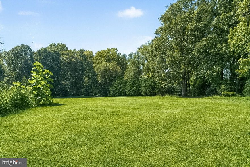 Presenting an exceptional and rare offering: 5.12 acres of pristine, elevated land perched amid lush tranquility,  available now as a blank canvas for your architectural vision. Set amidst mature woodlands, this elevated parcel delivers resort-style seclusion while remaining just minutes from the vibrant heart of McLean. Water and gas hook-ups are available at the site. Please see documents for the site plan.