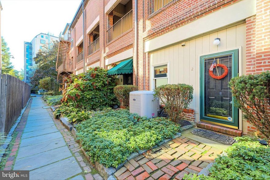 Experience waterfront living with character and style in this beautifully updated one-bedroom condo tucked along the scenic Brandywine River. Blending industrial-inspired design with warm, inviting touches, this residence offers exposed brick walls, wood beam accents, and captivating river views from a private balcony that truly sets the tone for the home.
Located in the desirable Superfine Lane community, the building welcomes residents with secure keycard access and charming garden-style entryways. Inside, the thoughtfully designed layout unfolds into an open living space filled with natural light and architectural detail. Hardwood flooring, concrete girder ceilings, and oversized sliding glass doors create a modern loft-style atmosphere while maintaining a cozy, comfortable feel.
The galley kitchen has been tastefully updated with granite countertops, stainless steel appliances, custom cabinetry, tile flooring, and rich textural elements that complement the home’s industrial aesthetic. The spacious bedroom offers a peaceful retreat with dramatic floor-to-ceiling brick detail and a large window that brightens the space throughout the day.
Step outside onto the private balcony and take in relaxing views overlooking the water, the perfect backdrop for morning coffee or unwinding at the end of the day. Conveniently located near downtown Wilmington dining, entertainment, and regional transportation, this condo offers an ideal blend of urban convenience and waterfront charm.