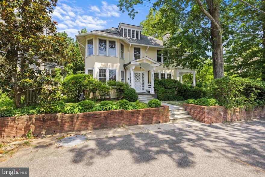 Neighborhood treasure! Enchanting 1912 Queen Anne with romantic wraparound porch and over 1/4 acre of private surrounding gardens tucked away on coveted, hidden-in-plain-sight Highland Place. Open and airy interior with many historic period details preserved plus lovely light and leafy views from large windows and many porches - all in pristine, turnkey condition with lovely custom window treatments and Svenskt Tenn Wallpaper. Main level with 9'6" ceilings features formal living and dining rooms, study, and kitchen open to family room, all with easy social flow to the wraparound porch, landscaped gardens, and deep backyard. 5BR/4BA upstairs including large primary suite with en suite bath and dressing room. Fully finished LL. Easy driveway parking!