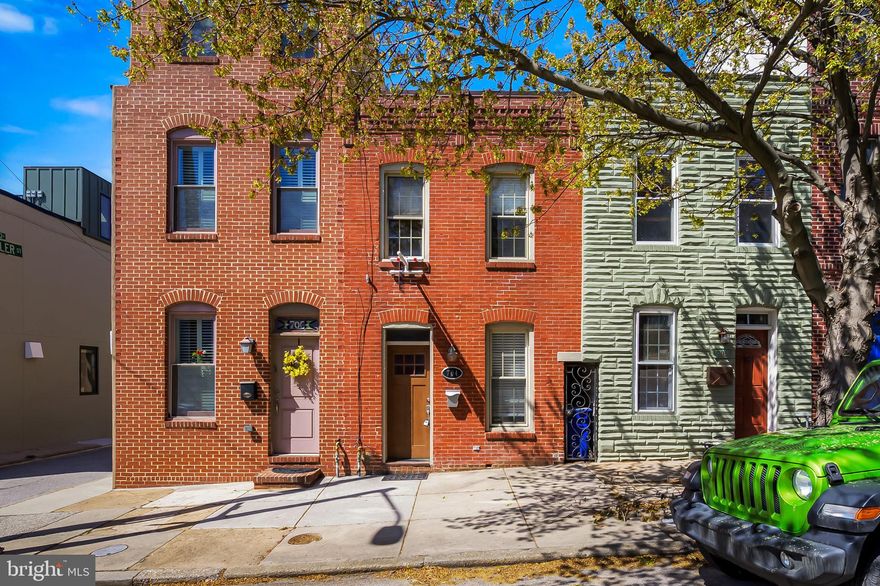 Meticulously maintained row home in the heart of Canton on one of the most sought-after streets, Baylis! Situated north of the square, this home is convenient to everything Brewers Hill, Patterson Park and Canton waterfront have to offer. The annual block party is not to be missed. This home is packed with tons of charm! Hardwood flooring, exposed brick archways, and brand new gourmet kitchen! Upstairs find 2 generous bedrooms and a full bath. Expansive two-tier rooftop deck offering beautiful city views! The backyard offers a place to spread out and the bonus of a massive storage shed for all of your overflow or hobbies. Welcome home!