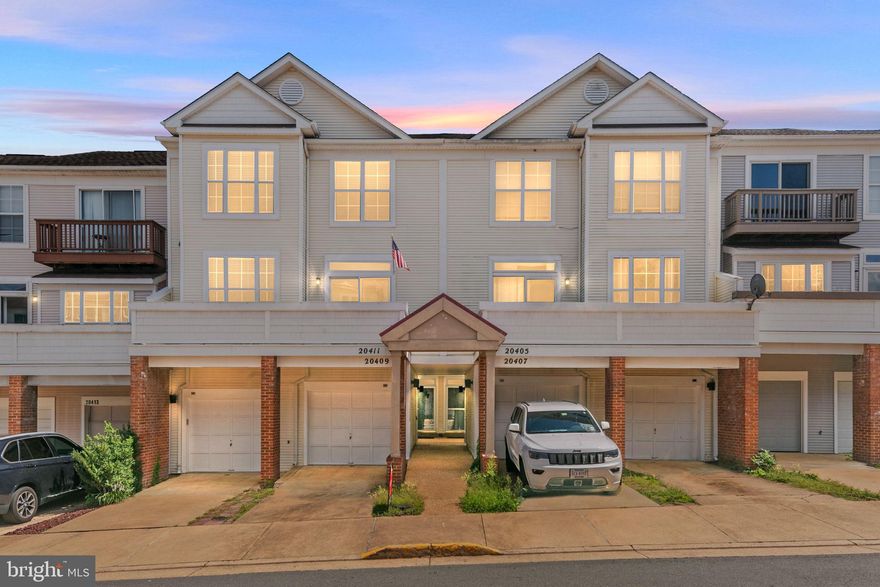 Enjoy this home that has outstanding location and charm  right in the heart of Ashburn.  This wonderful Townhouse has Three Bedrooms, Two Full and One Half Bathroom, and One Car Garage.  Enter the home, look up to the 9- foot ceilings, hardwood floors all with NO fees like condos!  (This may look like a condo on the outside with low maintenance, but THIS IS NOT a condo!!)  This home is ready to move in, updated kitchen, fresh paint, young carpeting, new sliding glass door, young roof and deck, there is almost nothing to upgrade here!  Kick back and enjoy a cozy fire when the cooler temps come back to Virginia.  This home is located very close to all kinds of amenities like: multiple swimming pools, sports courts, trails, shopping and the HOA membership includes access to the Ashburn Sports Pavilion near the lake in Ashburn.  Welcome HOME!