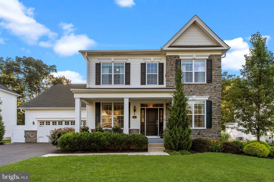 Nestled in the charming community of Doylestown Greene, 21 Greenway Dr offers a luxurious blend of elegance and comfort. Located within walking distance to the vibrant downtown of Doylestown Borough, this property offers the access of “in-town” living, while also offering the serenity of quieter living situated on a cul de sac. Built in 2018, this exquisite 5-bedroom, 3.5-bathroom estate spans 4,336 square feet between the 3 levels. Adding to its charm, the home boasts excellent curb appeal with its stone accent façade and inviting covered front porch, creating a warm and welcoming entrance.

Step inside to the center hall foyer with 9-foot ceilings, leading you into a sunlit living room adorned with crown moldings and a dining room featuring wide plank bead board accents. The open-concept kitchen and great room are the heart of the home, complete with a cozy wood-burning fireplace, gleaming quartz countertops, farm sink, 42-inch cabinetry, and top-of-the-line stainless steel appliances. The bright adjoining breakfast area opens to the family room and both rooms feature an abundance of large windows overlooking the spacious Trex deck, which is equipped with an outdoor kitchen; perfect for entertaining while overlooking the stunning in-ground, heated, saltwater pool and spa. Enjoy entertaining or relaxing in your private back yard oasis that feels like resort living. 

This residence is also designed for versatility, featuring a first-floor multi-generational suite and a second-floor primary suite a walk-in closet with custom organizers, and a large bathroom featuring double bowl vanity, vaulted ceiling, and a huge shower with penny tile accent and frameless glass door. In addition to the primary suite upstairs, you will find 3 secondary bedrooms with fantastic closet space, and the hall bathroom. The finished lower level includes an incredible exercise room with rubber flooring and ballet barre, enhancing the home's appeal for active lifestyles. A two-car garage provides ample storage and convenience with inside access direct to the laundry room.

A finished basement offers high ceilings and a perfect area for additional recreation activities, while also offering a rough in for a future bathroom. 

Located within the acclaimed Central Bucks School District, the property offers excellent accessibility to major routes like Route 611 and Route 202, making it ideal for commuters. This home is more than just a place to live; it's a lifestyle. Discover the perfect blend of luxury, comfort, and community at 21 Greenway Dr.