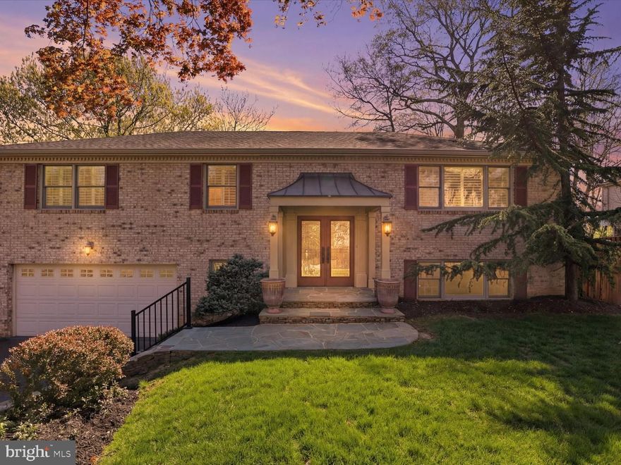 Welcome to 10801 Greene Dr, a waterfront home in the Harbor View neighborhood offering direct access to the water and a peaceful connection to nature. Enjoy scenic tidal water views right out the back, creating a tranquil backdrop for everyday living.

This 4-bedroom, 3-bath residence features hardwood floors and a well-equipped kitchen with stainless steel appliances, ample cabinetry, and bar seating that overlooks the water. The spacious living and dining areas are ideal for both entertaining and comfortable daily living.

The lower level offers a large recreation room complete with a wet bar, providing additional space to gather, unwind, or host guests. Outdoors, a large deck with a screened, gazebo-style sunroom is designed for year-round enjoyment, featuring windows and heat for the winter, as well as screens and a fan for warmer months. An elegant patio with a dry bar adds even more space for entertaining.

An attached two-car garage adds convenience, and a membership to the neighborhood marina conveys with the property, offering added enjoyment of the waterfront lifestyle.

Experience a blend of indoor comfort and outdoor living in this unique setting.