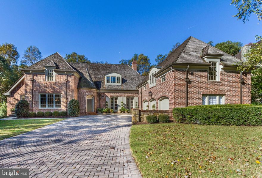 OPEN HOUSE CANCELLED.  HOUSE UNDER CONTRACT.  Absolutely stunning CUSTOM Normandy Style home designed by Donald Lococo and built by Jeffco, backing to Parkland. This home transports you to another place and time from the European motor court to the large gallery designed for today's living, to the dreamy main floor bedroom suite, huge club/media room, chef's kitchen, finest finishes and so much more.  Must see to appreciate.  Won't last.