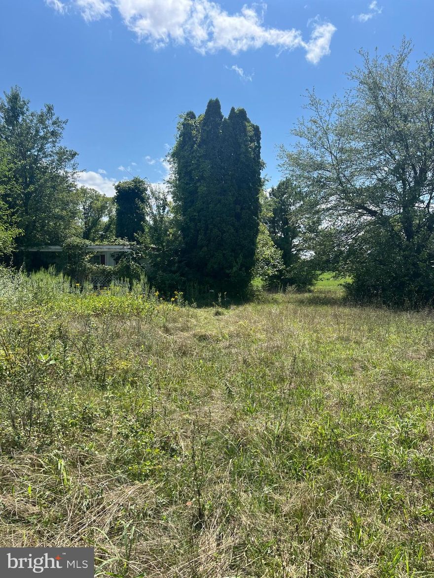 .65 Acres located on Apple Harvest Drive (Route 45 West). This is a lot with a well and septic for 3 bedrooms.
 Mobile on property is at no value and seller will not warrant it's condition. Selling AS-IS.