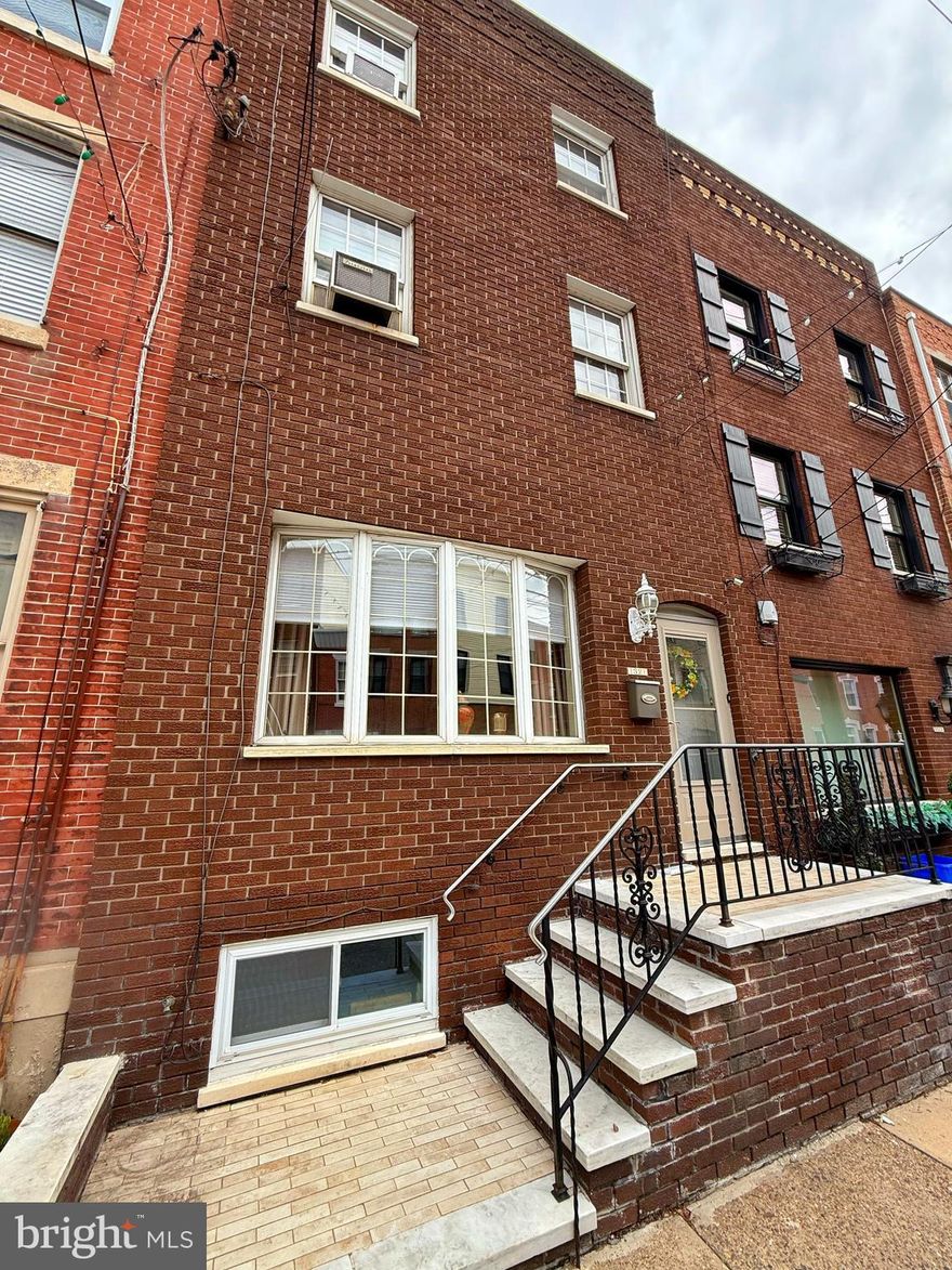 Large 4-Bedroom Home in the Heart of Red-Hot Passyunk Square
Welcome to your dream home in the vibrant and highly sought-after neighborhood of Passyunk Square! This spacious 4-bedroom, 2.5-bathroom home offers the perfect blend of classic charm and modern convenience. The first floor boasts gleaming hardwood floors, a bright and open layout, and plenty of space for entertaining or relaxing. Step out to a generously sized backyard—ideal for gardening, grilling, or simply enjoying the outdoors in your own urban oasis with a cute little garden. 
The second floor features three comfortable bedrooms and a full bathroom, perfect for a growing family or guests. Upstairs, the third-floor in-law suite offers incredible flexibility with a large private bedroom, a full bathroom, and a kitchenette area ready for your custom touches—with space for a refrigerator and stove, it’s perfect for guests, extended family, or even a rental opportunity. The basement is fully finished with tons of storage and a rear laundry room. 
Location is everything, and this home has it all. Nestled just steps from Acme and CVS, and surrounded by some of Philly’s most iconic cheesesteak spots, restaurants, and cafes, you’ll love being in the middle of the action. Public transportation is just down the street, and you’re minutes from Center City and the lively East Passyunk corridor, known for its award-winning restaurants and unique local shops.
This is your chance to own a spacious, versatile home in one of Philadelphia’s hottest neighborhoods!