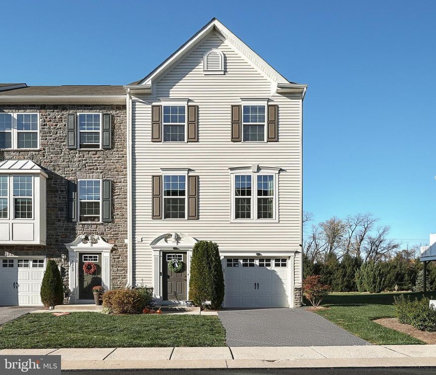 OPEN HOUSE on Jan. 29th is cancelled. Welcome Home! Located in the private gated golf community of Regents Glen in the York Suburban School District, this end unit townhome boasts proximity to the luxury & convenience of golf, pool, dining and fitness opportunities! Walking distance from both shopping & the York Rail Trail; it's only minutes from I-83, York College &  local hospitals! First level features a tiled entry, adjoining one car garage, half bath, finished family room with walkout sliding doors & engineered hardwood flooring! The extra high ceilings and open layout on the second level maximizes the natural light for everyday living & entertainment ambience and function! Kitchen features include granite countertops, island, double door pantry and stainless steel appliances. Your spacious dining area sparkles with a gorgeous chandelier! The upper level primary bedroom has a walk in closet, engineered hardwood flooring, en suite full bath with double vanity and spacious tiled shower! Two additional bedrooms, full bath and laundry complete the upper level. Relax knowing your lawn care and snow removal are being meticulously maintained! Seller is offering a one year HOME WARRANTY for buyer! Call for your showing appt. today! All of this beauty, comfort and convenience can be yours!