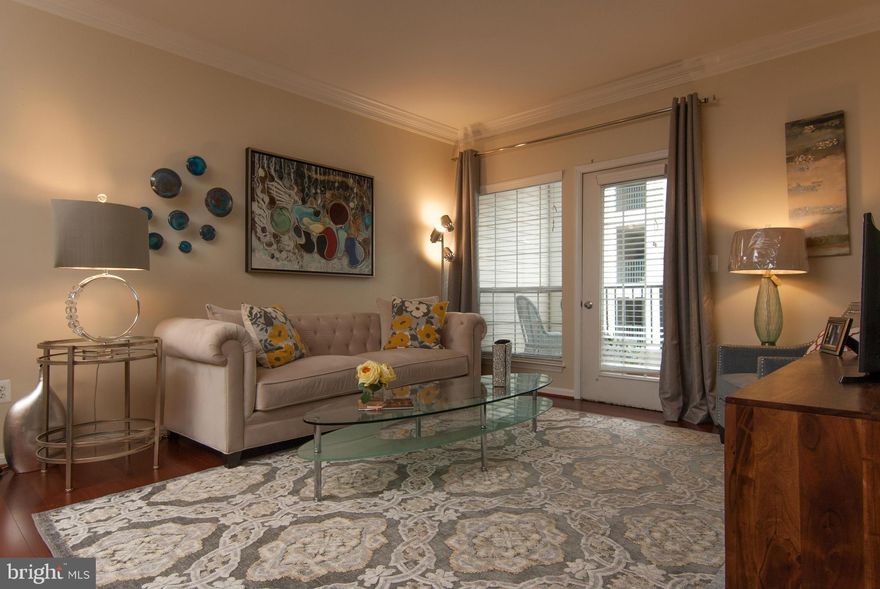 Beautiful spacious 2BR 1BA 2nd floor unit w/assigned garage parking. Gorgeous Brazilian cherry hardwood floors throughout living area with carpet in bedrooms, large walk in closet in master bedroom. Shuttle/walk to metro, busses to Old Town, pool, BBQ's, fitness center, clubhouse. Easy Access to 495, and close to 395. Available fully furnished for additional fee