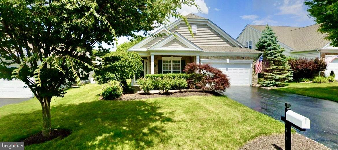 Welcome to gracious, one-floor living in this meticulously maintained 2-bedroom, 2-bath home —of the highly sought-after 55+ community, Traditions at Longwood in Kennett Square. This beautifully maintained single-level home is ideally situated on a premium lot and offers both comfort and convenience. The recently updated kitchen features abundant cabinetry, stainless steel appliances and new wood plank tile flooring, perfect for both everyday living and entertaining. The open-concept layout boasts 9-foot ceilings, hardwood floors throughout the family room, dining area, and hallways, and oversized windows that fill the space with natural light. The family room flows seamlessly from the kitchen and includes a gas fireplace and access to a spacious rear deck, ideal for relaxing or entertaining. The large primary bedroom suite is expansive, featuring a tray ceiling, ceiling fan, a large walk-in closet, and a beautifully appointed primary bath with double vanity, remodeled handicap-accessible shower, beadboard detailing, and a linen closet. The second bedroom offers versatility — ideal as a guest room, office, or
hobby space — with access to a full hall bath complete with a tub. Additional highlights include a separate laundry room with washer and dryer, and a two-car garage for added convenience. This exceptional home is located in a community rich with amenities, including two clubhouses, a swimming pool, fitness center, library, sauna, tennis, pickleball, and bocce courts, garden plots, and walking trails among 31 acres of
common grounds, 19 acres of preserved wetlands, and a scenic two-acre pond. The community also offers a full calendar of social activities and events. All of this is just minutes from the charming town of Kennett Square, known for its unique shops, restaurants, and cultural attractions — and with easy access to
Longwood Gardens, the Brandywine Valley, and major highways.