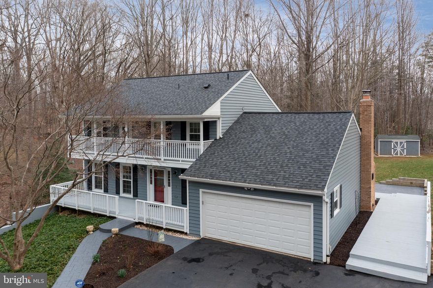 *** OFFER DEADLINE IS TUESDAY AT 9 AM *** Don't miss this CHARMING MOVE-IN READY 3+ acre home!  This home has been IMPECCABLY MAINTAINED & beautifully updated!  The moment you drive up you will fall in love with this home! Start with the extensive exterior lighting, the lit Flag pole, the gorgeous landscaping & then you spot the picturesque  large front porch with a double front balcony encasing the entire front of this home & you know you’re in love!  This home was maintained by someone who thought of everything & spared no expense to lovingly maintain & update it! The large driveway has a huge parking pad which can easily accommodate an  RV plus the necessary RV plug. Enjoy lovely decks on all 3 sides of this home in addition to  custom stamped concrete sidewalks & porches.  If you yearn for privacy yet need quick access to commute options this home is for you with its easy access to the PW Parkway, the VRE & Commuter lots.  Stepping inside this home you are greeted with gleaming hardwood floors throughout the entire first floor, stairway & upstairs hallway!  Updated large windows flood the living room with light!  The dining room is large enough to accommodate your entertaining needs & an updated kitchen with distinguished floor to ceiling updated cherry cabinetry, updated counter-tops & newer appliances makes cooking a joy. This kitchen also has 2  pantries, 1 which is especially large to accommodate specialty cooking appliances. The kitchen & bright breakfast room have easy sight lines to the comfortable family room with its brick wood-burning fireplace & easy access to the palatial deck!  You also find a convenient  laundry room leading out to the nice garage which sports full insulation, finished walls & built-in cabinetry.  Upstairs you will love the custom finishes on the hall & master bathrooms.  The large master suite not only has a walk-in closet but also allows you to step out to the large top level balcony which encompasses  the entire front of the home.  Downstairs you find a completely finished suite with a full kitchen, full bath & its own private walk-out patio.  Great for an au pair, mother-in law suite, rental or your very own fun recreation room!  Outside there is not only  a lovely huge yard but a large storage shed for your tools, toys & equipment!  Well & septic have been very well-maintained / whole house water filtration system  & water softner /new roof 2016 /  new windows 2012 / new insulated siding 2017 / new hot water heater 2018 etc! Enjoy years of MAINTENANCE-FREE living here! Don't delay with this one-of-a-kind home!