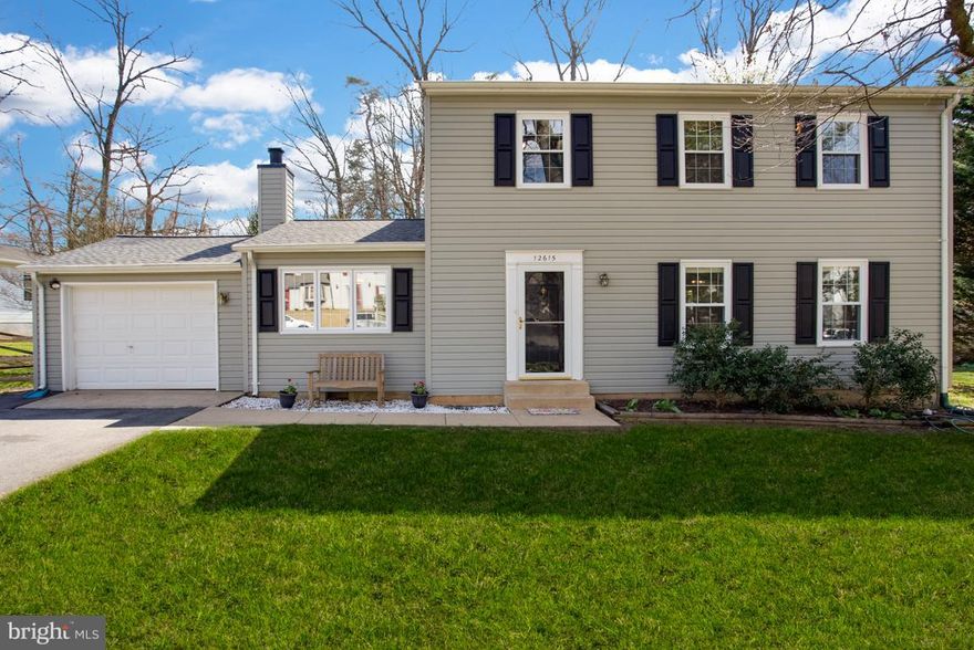 Colonial style home on a quiet cul-de-sac in desired location.  Features incl: lge wooded lot w/fenced-in rear yard, outstanding screened-in porch & deck.  Charming family room w/ FP and gleaming HD floors. Updated kitchen with lots of storage and counter space.  Updated main & master baths.  Lots of fresh paint, new carpeting, and storage on lower level.  Sought after schools.