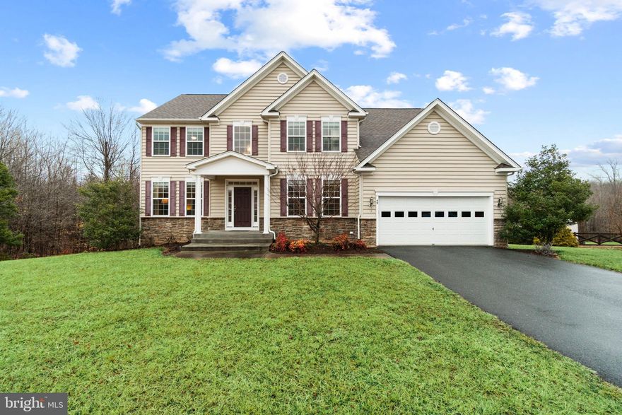 BEAUTIFUL LARGE COLONIAL NESTLED ON PRIVATE PARKLIKE SETTING.   PRISTINE HOME FEATURES 4 BEDROOMS AND 3 FULL BATHS ON UPPER LEVEL.  HUGE PRIMARY BEDROOM WITH HIS / HERS WALK IN CLOSETS, AND DELUXE BATH.  LARGE SECONDARY BEDROOMS COMPLETE THE UPPER LEVEL.  MAIN LEVEL BOAST BEAUTFUL HARDWOOD FLOORS, FORMAL LIVING & DINING ROOMS, OFFICE, BREAKFAST ROOM, GOURMET KITCHEN WITH TABLE SPACE, FAMILY ROOM WITH FIREPLACE, POWDER ROOM 1/2 BATH, AND MAIN LEVEL LAUNDRY.  WIDE OPEN FLOOR PLAN PERFECT FOR ENTERTAINING!  INGROUND SPRINKLER SYSTEM.  UNFINISHED WALKOUT BASEMENT WITH BATH ROUGH IN  FOR FUTURE EXPANSION.  GREAT 3.8+ ACRE LOT!  WELCOME HOME!