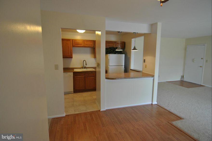 All this home needs is you!  Beautiful new kitchen, , updated bathrooms, new neutral carpet throughout, new laminate flooring and freshly painted.  All you need to do is move right in and just in time to enjoy the community pool this summer.  Enjoy the balcony overlooking the beautifully landscaped common grounds.