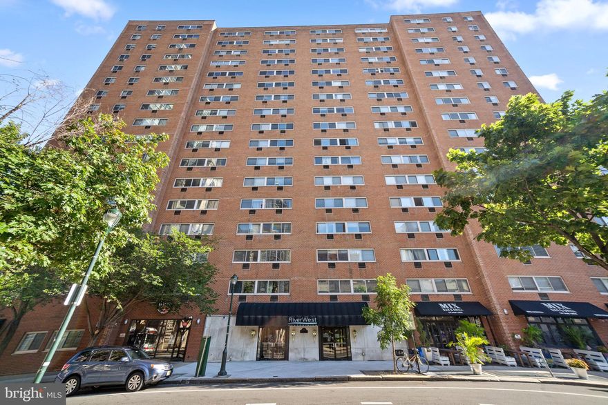 Welcome to this beautifully renovated unit at the River West Condominium. Located on the 12th floor with city views and bathed in southern light. As you enter, you'll find an efficient and thoughtfully laid out kitchen, featuring granite countertops, stainless steel appliances, gas range and additional butcher block prep space. Off the kitchen is a coat closet and the living room; freshly painted a contemporary slate blue, with recessed lighting and hardwood floors throughout. The bathroom showcases a subway tiled shower with a built-in bench and a roomy vanity for additional storage. The bedroom is painted a serene sage green, a perfect space to relax and unwind. Here you'll find a generous sized closet and plenty of additional space in the room for a dresser or desk. Enjoy living just steps away from Rittenhouse Square, with world class shopping and dining, the river trail and 30th St Station. The River West offers secure key fob entry, 24/7 front desk service, package room, fitness center, community/media room and onsite laundry. Book your showing today!