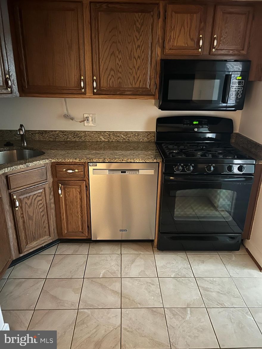 Rent includes electricty, gas, water, sewer, condo fee, trash 
Carpet  replaced with engineered vinyl in living room, dine room, both bedrooms, - draws and cabinets getting liners- 
NO CATS - DOGS ARE CASE BY CASE

Deck overlooks trees,  excellent condition - washer and dryer in kitchen, 

Best value  in Reston for 2 Bedroom/2 Bathroom- electricity, gas and water included in rent-