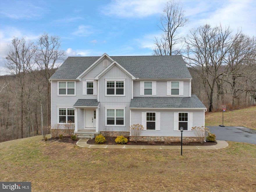 OPEN HOUSE Sunday April 12th from 1pm-3pm!  BEAUTIFUL like-new home in the desirable Twin Valley School District set on over 4.25 partially wooded acres! Gorgeous flooring welcomes you into the entryway and flows into a dedicated dining room, while an additional formal living room offers flexible space for an office, playroom, or sitting area.

The bright white kitchen features a tiled backsplash, sleek appliances, and a huge stylish island with abundant storage—perfect for gathering and entertaining. The eat-in kitchen opens to both the deck and the spacious family room, creating an easy flow for everyday living.  A HUGE walk-in pantry and mudroom with built-in storage add functionality, along with a convenient half bath on the main floor.

Upstairs, the primary suite offers a large walk-in closet and a beautiful en suite bath complete with a tiled shower, luxurious soaking tub, and dual sinks. Three additional bedrooms and an open loft area provide even more space for an additional family room, play area, or flex space.  Laundry is located on this floor with all of the bedrooms! 

A two-car garage and over 4.25 acres of partially wooded land complete this impressive property, offering both privacy and room to enjoy the outdoors.  Just minutes from Weaver's Orchard!  Don't miss this opportunity in Twin Valley!
