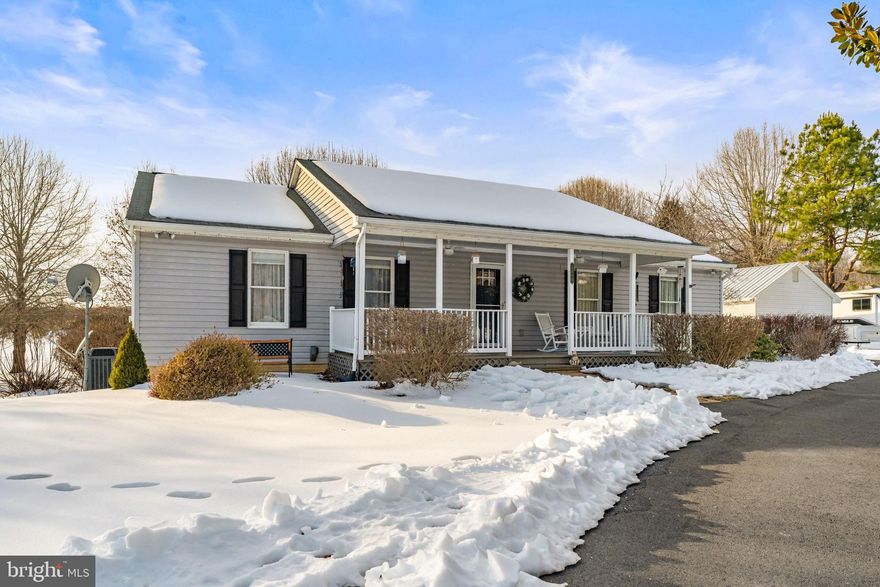 Well maintained ranch house and detached two car garage on a beautifully landscaped five acre lot. The house is set back from the road with a paved maple lined driveway. Morning sunrise views eastward over a manicured lawn and plantings. Enjoy the large front porch with steps up from the Garage. Established shrubs and ornamentals encircle the home. A large trex deck with kitchen and dining area entrances offer views of sunsets over the Blue Ridge mountains. Large backyard with water and electricity access stations. A walk out basement with a brick path to shaded bird stations, a small garden and hayfields. A modernized kitchen with new refrigerator and marble counters. Chair-rail molding throughout the family room, dining room and hallway. Water treatment including acid reducer and softener and a central vacuum system. Clean basement apportioned into an exercise area, a play area and a workshop area.  Located in Culpepper County this property is just 20 minutes from Warrenton and only 10 minutes from the quaint town of Washington, Virginia.  Live a rural lifestyle while having easy access to the Shenandoah National park and the Washington metropolitan area.