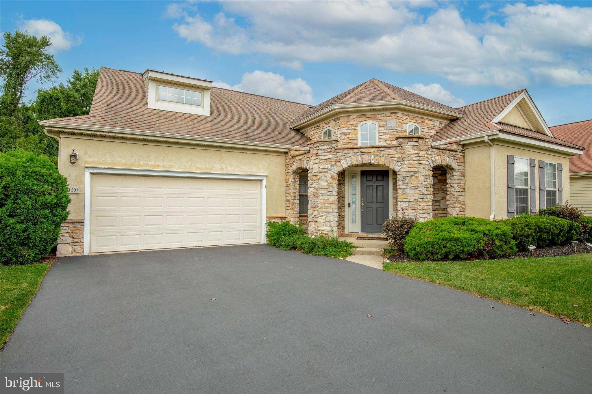 Looking for ONE FLOOR Living in an ACTIVE 55+ Community with LOTS of Amenities? Then this Heritage Creek Estate rancher - 2BR/2BA home is for you! This desirable 55+ community includes numerous amenities - features a 17,000 sq ft clubhouse with indoor and outdoor pools, two fitness rooms, library, ballroom, club rooms, shuffleboard table, tennis & bocce courts! A covered front porch leads you to the open floor plan where you will immediately notice the gracious living room & dining room with 12' vaulted ceilings. The kitchen is open to the family room - the family room includes a gas fireplace. and includes 42" cabinets, ample counter space, and a sliding glass door leading directly to the patio outside where you can grill and entertain. Oversized primary bedroom with large walk-in closet and private bath with deep soaking jetted tub and separate shower. Access the 3 season Florida room directly from the primary bedroom overlooking an extremely private and wooded setting. The second bedroom is nicely sized and adjacent to the full hall bathroom. First floor laundry room and two-car garage with pull-down stairs to attic with additional storage. Engage in many social activities or enjoy the abundance of sidewalks for leisurely walks. Additionally, the monthly association fees cover services such as grass cutting, weeding, grass treatment, snow removal, and trash. Conveniently located to shopping and major roadways for easy commuting, schedule your appointment today.