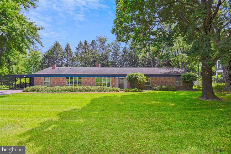 EASY LIVING IN THIS STEVENSON SPRAWLING BRICK RANCHER WITH 2 CAR CARPORT. FEATURES INCLUDE PARQUET FLOORS, LIVING ROOM WITH 2 WAY FIREPLACE, DINING ROOM, RECESSED LIGHTING, SUNROOM OFF LIVING ROOM WITH WALLS OF GLASS & GRANITE KITCHEN WITH LARGE ISLAND & BREAKFAST BAR. SPACIOUS FAMILY ROOM OFF KITCHEN HAS CUSTOM BUILT-INS, 2 WAY FIREPLACE & SLIDERS TO EXTERIOR. HUGE PRIMARY BEDROOM INCLUDES 3 CLOSETS & DOOR TO PRIVATE DECK. THE LUXURY PRIMARY BATH INCLUDES A SOAKING TUB & SEPARATE SHOWER PLUS DOUBLE VANITY. THE OFFICE OR 4TH BEDROOM HAS A PRIVATE BATH WITH SHOWER. RELAX ON YOUR GLASS ENCLOSED PORCH OVERLOOKING YOUR TREED BACKYARD. AIR CONDITIONER REPLACED 2019. THERE IS A WALKING PATH TO THE ELEMENTARY SCHOOL ADJACENT TO THIS HOUSE. SEVERAL WINDOW SEALS ARE BROKEN & BEING SOLD "AS IS".