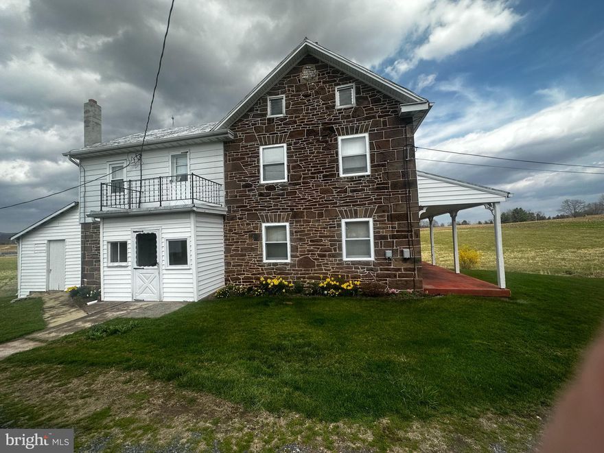 Set against the scenic backdrop of rolling countryside, this exceptional 45.5-acre property at 612 Capitol Hill Road in Dillsburg, PA offers a rare blend of history, versatility, and opportunity. With an impressive 947 feet of road frontage, this expansive parcel invites you to imagine, create, and cultivate a lifestyle rooted in both charm and potential.
At the heart of the property stands a historic stone residence, originally built in 1815 by Jacob and Elizabeth Larue. The home serves as a reminder of the land’s deep agricultural roots while offering a unique foundation for restoration or modernization. Surrounding the home, large barns and outbuildings provide ample space for storage, farming operations, or creative repurposing; perfect for those seeking a working property or a private rural retreat.
Once a thriving farm that supported over 1,000 chickens and 200 pigs, this land played a meaningful role in the local agricultural economy. Over time, the property evolved with the surrounding infrastructure and is now uniquely divided by Route 15, with approximately 7–8 acres positioned on the west side of the roadway. 
Today, the land stands ready for its next chapter. The property’s Open Space zoning presents a wide range of possibilities, from continued agricultural use to residential development; buyers are encouraged to explore permitted uses and envision the full potential this acreage holds.
With a minimum 2-acre lot requirement for residential use, the property offers an exciting opportunity for subdivision or the creation of a private estate community, all while maintaining a sense of space, privacy, and natural beauty. Whether you’re dreaming of a homestead, an investment opportunity, or a legacy property to pass down for generations, this land delivers unmatched flexibility.
Located in a peaceful and picturesque setting, yet still within reach of everyday conveniences, this property captures the essence of rural Pennsylvania living. Opportunities like this; where history, acreage, and future potential converge; are truly rare. Come walk the land, breathe in the possibilities, and bring your vision to life.