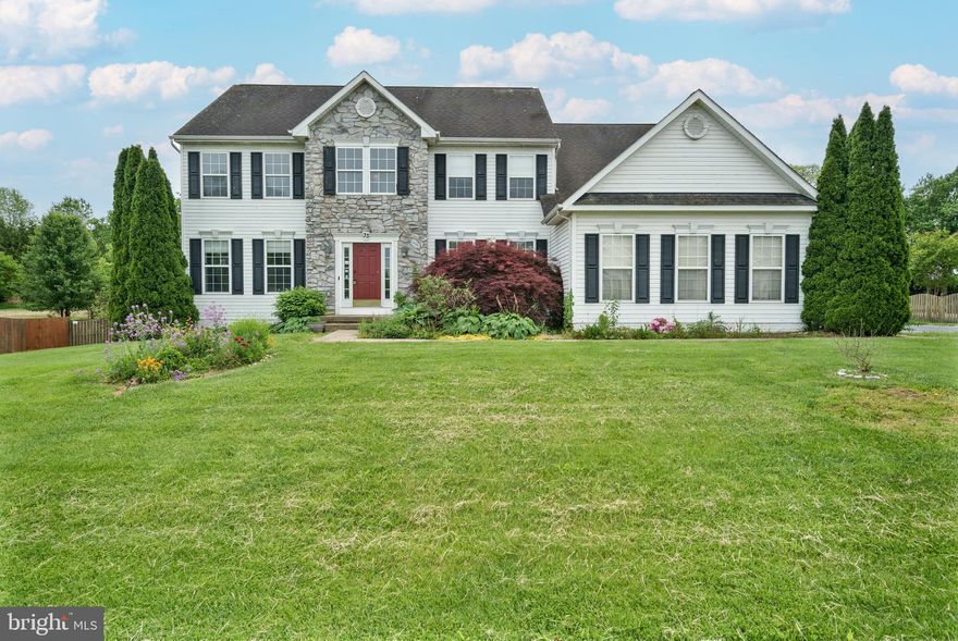 Price adjusted 20k. Be ready to be WOWED! Professionally painted top to bottom and shows beautifully. Welcome to 33 General Early Drive, a stunning 4-bedroom, 3.5-bath colonial home offering over 4,700 square feet of living space with a 3-car side loading garage on a level .75 acre lot with a full finished basement and fully fenced backyard. Freshly painted top to bottom and new LVP and carpet throughout. As you enter the home you are greeted off of the foyer by French doors to large den/office. The sunken family room is outfitted with a stone gas fireplace that is off the kitchen. The kitchen is loaded with cabinets, Corian counters and a large center island with raised bar section as well as a cooktop. The kitchen is also equipped with double wall ovens. All appliances are stainless steel. All The oversized primary suite w vaulted ceiling boasts a cozy 3-sided fireplace, a sitting area, an en-suite bathroom is outfitted with dual sinks,  a shower and soaking tub, and a spacious walk-in closet that is accessible from either the bedroom or bath. A jack and jill bathroom with dual sinks connects 2 of the 4 bedrooms upstairs. The full walk-up finished basement offers a full bathroom with tub/shower, a hobby room area and set up for a 2nd kitchen to be installed. All electrical and plumbing is in place, just needs cabinets, counters and appliances. Enjoy outdoor gatherings on the gorgeous deck accessible from the kitchen, overlooking a flat, fenced 0.75-acre lot. Built in 2002 with vinyl siding and stone construction, this home is conveniently located minutes from Route 340, providing easy access to local amenities. Don't miss this great opportunity!!