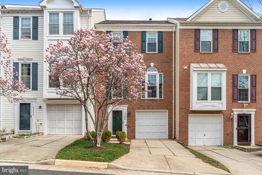 Welcome to 45608 Iron Horse Terrace — a beautifully updated 2,142-square-foot townhome nestled in the heart of Dominion Station, where thoughtful updates and timeless design come together to create a warm and welcoming retreat.

From the moment you arrive, the charming brick exterior and blooming trees provide wonderful curb appeal, setting the tone for the care and attention to detail found throughout the home. Step inside to discover newly installed LVP flooring on the lower level, refinished hardwoods on the main floor, updated lighting, and a seamless flow across the spacious layout. Sunlight pours into the open living and dining areas—perfect for both everyday living and entertaining—while a cozy gas fireplace adds a touch of warmth and charm.

At the heart of the home lies the stunning remodeled kitchen, thoughtfully designed with two-tone cabinetry, undermount and in-cabinet lighting, quartz countertops, stainless steel appliances, and generous prep space for the everyday chef. Just off the kitchen, the inviting sunroom opens to an elevated Trex deck—ideal for your morning coffee or evening gatherings. A stylish powder room completes the main level with both function and flair.

Upstairs, the expansive primary suite offers a peaceful sanctuary, featuring new carpet, a ceiling fan, and a spa-inspired en-suite bath with a soaking tub, frameless glass walk-in shower, heated floors, and a double vanity topped with quartz counters. Two additional bedrooms share a beautifully updated full hall bath, complete with a new vanity, modern lighting, and soft, neutral carpeting that continues throughout the upper level.

The fully finished lower level adapts effortlessly to your lifestyle needs—whether as a home office, gym, or playroom. With a half bath, generous storage, and walk-out access to the fully fenced backyard, it’s a highly functional and flexible space. You’ll also find a separate laundry room with full-size washer and dryer for added convenience.

Outside, enjoy the privacy of a fully fenced yard with a brick patio—perfect for gardening, play, or quiet relaxation. With recent updates including a newer roof (2018), new windows in the rear of the house (2024), hot water heater (2025), kitchen renovation (2023), freshly painted interior (2025), new carpet on the upper level (2025), refinished hardwood floors on the main level (2025), and new LVP flooring on the lower level (2025), this home has been meticulously cared for and thoughtfully updated.

Located in a sought-after community with amenities like a clubhouse, pool, playground, and walking trails—and just minutes from major commuter routes, the Loudoun Gateway metro stop on the silver line, the W&OD Trail, Dulles Airport, and top local shopping and dining—this home truly has it all.

Welcome home!