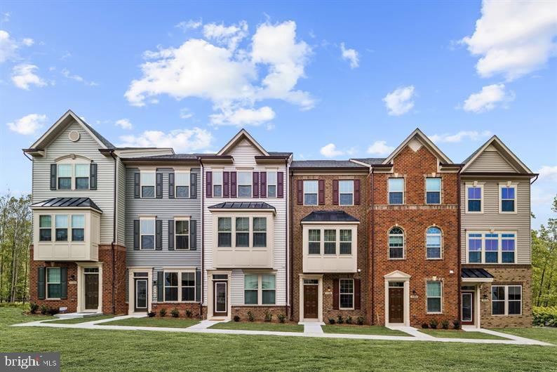 To be built Clarendon . Yes, the popular Clarendon is back at Parkside! Never has convenient townhome living felt as luxurious as it does in the Clarendon.
On the main level you will find yourself in a welcoming and light-filled open floorplan, more spacious than you thought possible in a townhome. A gourmet kitchen creates a sense of warmth and unity, while the dining room gives a perfect place for entertaining. A huge family room can be furnished in the way that suits you best; while a large coat closet and powder room are tucked away but convenient for guests. Upstairs, the primary bedroom is an oasis and the primary bath features a large shower, dual vanity and gigantic walk-in-closet. A second bedroom also features its own bath. Laundry is conveniently located on the upper level. Home includes a one car garage, quartz kitchen countertops. The lower level includes a recreation room or a third bedroom with full bath.
Photos are representative only and other homesites may be available. Parkside makes coming home and staying there incredible appealing with its Hanover, MD location. Parkside is an amenity filled Community featuring a Pool, Clubhouse and Trails! The location is thoughtfully chosen and provides easy commuting to DC, Baltimore, and Annapolis. Plus it is right next door to Fort Meade and the NSA. Minutes from I-295, Rt.175, & Rt. 32, this community enables homebuyers to enjoy a convenient lifestyle close to everything. Odenton is just 10 minutes away which offers the Odenton MARC stop for easy commuting.