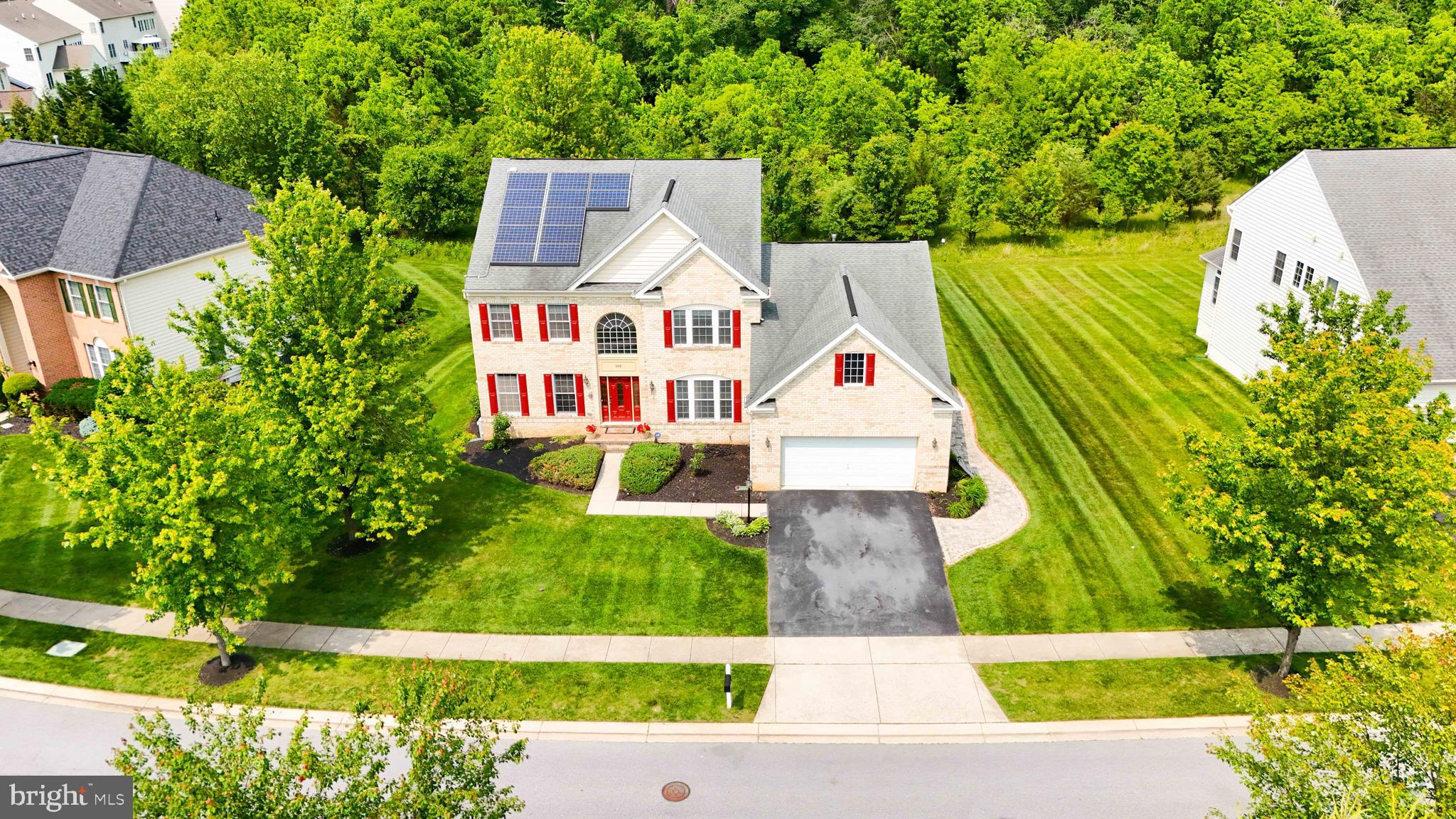 This impressive 5-bedroom, 3 full and 2 half-bath Traditional Colonial offers nearly 5,000 square feet of refined living space and timeless design. From the moment you enter the light-filled two-story foyer, you'll be captivated by the open layout and elegant architectural details.
The heart of the home is the stunning two-story family room with soaring ceilings, a wall of windows, and a cozy fireplace—perfect for gathering and relaxing. Beautiful hardwood floors flow throughout most of the main level, which also features a office or sitting room, ideal for working from home.
The gourmet kitchen is a chef’s dream, complete with a large island and cooktop, wall oven and microwave, stainless steel appliances, granite countertops, tile backsplash, and upgraded 42” cabinetry with a walk-in laundry/mudroom adds convenience and function..
Host unforgettable dinners in the elegant formal dining room, adorned with stately columns and detailed trim, or relax in the cozy living room perfect for intimate gatherings. The spacious main-level primary suite features generous walk-in closets and a luxurious bathroom with a soaking tub for ultimate relaxation.
Upstairs, you’ll find a 2nd primary suite with full bathroom, and additional guest rooms to comfortably accommodate family and visitors.
The fully finished lower level expands your living space with room to entertain, relax, or host guests, along with a convenient half bath.
Outside, enjoy a flat, landscaped backyard with a spacious deck and patio—perfect for outdoor dining and relaxing in your very own private, park-like setting that backs to peaceful open space.
This home offers comfort, space, and elegance in one of Reisterstown’s most desirable communities. Don’t miss it!!