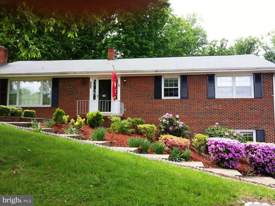 Great all brick home with large backyard offers 3 bedrooms on main level with 2 full baths. Spacious living room and formal dining room. Nice kitchen with newer appliances. Full finished walk-out basement with large rec room, woodstove and full bath and additional space with tons of options. Pets on case by case basis. Great price for the amount of space! Won't last long!!