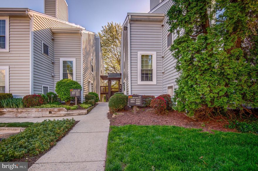 Welcome to the LARGE CLARIDGE MODEL AT 10087 Oakton Terrace Road in 'The Oakton' condo community (This home is NOT the smaller two bedroom loft ). This is a charming, garden style, beautifully updated condo in the heart of Oakton, VA! Offering exceptional space, light, and serene surroundings, this home combines comfort with convenience in an unbeatable setting. Upon entry, after a short flight of steps, you’re greeted by a spacious living area ideal for both entertaining and everyday relaxation. The open layout flows seamlessly between the living room, dining area, and kitchen, creating an inviting and functional space. Just off the living area, a lightfilled sunroom steals the show—boasting peaceful views of lush foliage and manicured grounds. This versatile space is perfect for a home office, reading nook, or guest retreat. The newly remodeled kitchen is bright and thoughtfully designed, featuring modern stainless-steel appliances, ample counter space, and abundant cabinetry—perfect for everything from gourmet cooking to casual meals. The primary bedroom offers generous space, a large closet, and a private en-suite bath. A second bedroom is complemented by its own newly renovated bathroom, showcasing updated fixtures and spa-inspired finishes. Extending from the sunroom, a private patio overlooks the picturesque grounds and provides an ideal spot for morning coffee, al fresco dining, or unwinding with a good book. UPDATES INCLUDE: FRESH PAINT WHOLE HOME (2026), NEW CARPET (2026), NEWLY PAINTED FRONT DOOR (2026), NEW HVAC (2024),  BATHROOM REMODEL (2022), NEW HARDWOOD FLOORING (2021), GOURMET KITCHEN REMODEL (2021), POT LIGHTS LIVING/DINING ROOM (2021).  Located just one mile from the Vienna Metro and I66, this community offers exceptional amenities including beautifully maintained grounds, a swimming pool, dog park, private parking, and engaging resident activities. With close proximity to Oakmont Rec Center and a short drive to the charming Town of Vienna, this home delivers both tranquility and accessibility. Don’t miss the opportunity to make this inviting Oakton condo your own!