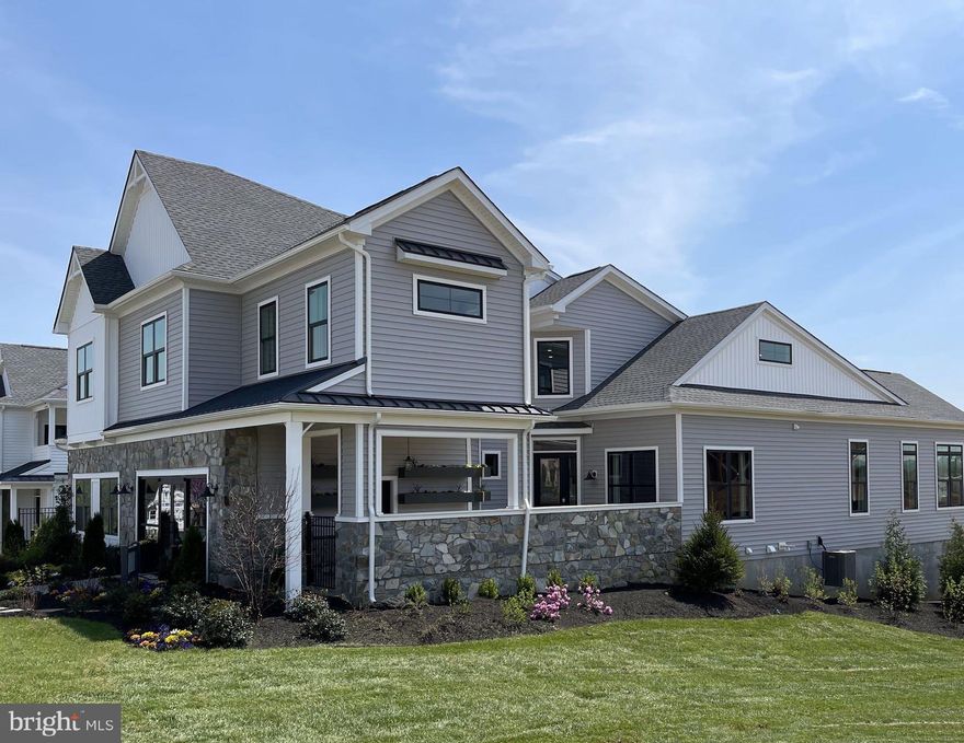 QUICK DELIVERY HOME - if you are looking for a new home in The Preserve at Marsh Creek and do not have time to wait for a new build this completed Wexford offers a 30 day move in. This Wexford model offers lots of privacy and a gated stone courtyard with beautiful grand staircase in the foyer entrance. 
Primary bedroom on the main level with a full bath. Large combination kitchen and great room with added Sunroom. Upstairs is an large loft with 2 nice size bedrooms and a full bath. All selections have been made and are included in the price.  Our beautiful clubhouse is now open and offers a full line of amenities. Act now this home will sell quickly.  McKee builders model homes are open everyday from 10 to 5. Stop in.