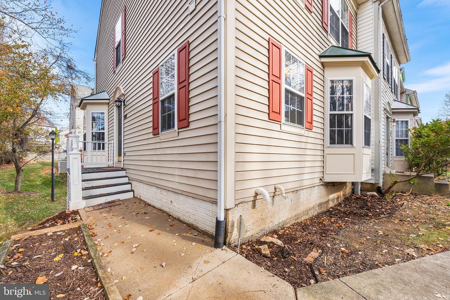 ***Brand-new HVAC system (installed July 2024), roof replaced in 2021. Main Water Line Replaced 11/24, brand new kitchen appliances installed 12/24*** Welcome to this beautifully updated 3-level end-unit townhome that combines comfort, style, and convenience. The main floor features stunning hardwood floors throughout, a spacious living room, and a well-designed kitchen complete with gorgeous granite countertops, double sink, gas stove, and plenty of cabinet space for all your needs. A convenient half bath is located just off the living room, adding to the home's functionality. 

On the second level, you'll find two generously sized bedrooms and a full bath, while the third level features a large bedroom with an en-suite full bath—perfect for a private retreat or home office.

Step outside to your ample-sized balcony, ideal for enjoying the outdoors or entertaining. The rear-attached garage and driveway accommodate two cars, offering easy access and plenty of parking space.

 This home is move-in ready and offers the perfect combination of modern finishes, ample space, and low-maintenance living. Don’t miss your chance—schedule a showing today!