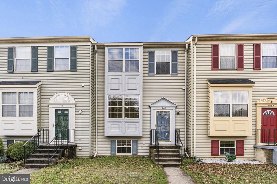 Welcome to 1963 Winslow Ct! This stunning 3-story, 3-bedroom, 3-bathroom interior townhome offers over 1500 square feet of living space. As you step inside, you'll be greeted by a seamless open space floor plan adorned with beautiful hardwood floors throughout. The main level features a spacious eat-in kitchen, perfect for your culinary needs, with direct access to a large deck, ideal for outdoor dining and entertaining.

Ascending to the upper floor, you'll find a fully carpeted space where all bedrooms are generously sized, offering ample room for relaxation and storage. Whether you're enjoying the cozy comfort of the indoors or the refreshing breeze on the deck, this townhome provides a perfect blend of style, comfort, and functionality for modern living. The basement has a beautiful fire place & large walk out level patio that is privately fenced in for convenience. Primely located near Jefferson Davis Hwy, Dale City, I-95 Express, Occoquan Historic District, Neabsco Creek, shops, parks, grocery stores & much more! Amenities include a playground & common community shared space.