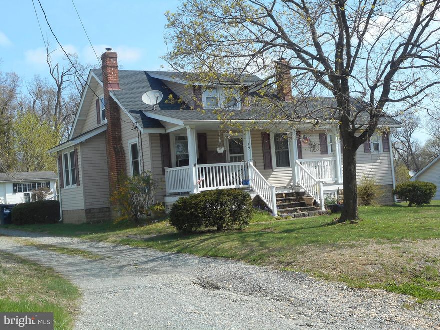 Nice Cape Cod  with newer  furnace, newer  roof, vinyl siding,  New  Water conditioner, Grape arbor  needs   work in back yard, old garage with sliding doors,  Must  see
