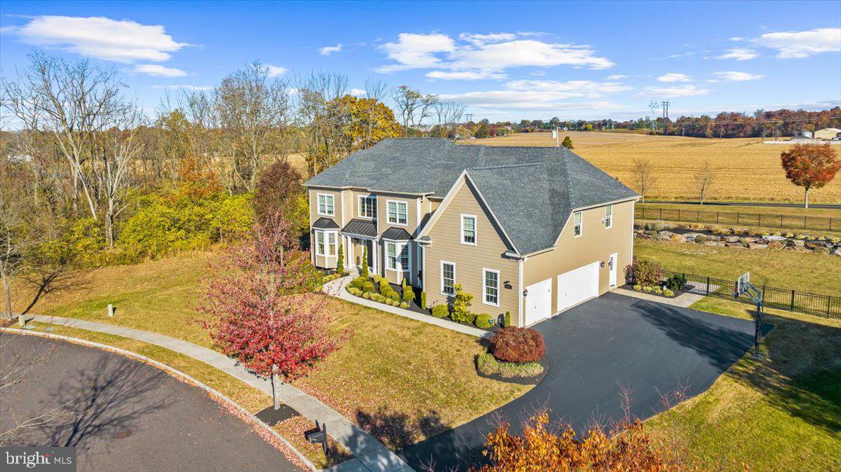 A Timeless Retreat in Country Club Estates – Where Luxury Meets Lifestyle. Tucked away in the prestigious Country Club Estates, where tree-lined streets and manicured landscapes create a picturesque backdrop, 155 Wentworth Circle stands as a testament to elegance, comfort, and modern refinement. This stunning 4-bedroom, 4.5-bath, 3.5 side entry garage, Colonial isn’t just a home—it’s a lifestyle upgrade, offering the perfect balance of tranquility, convenience, and timeless charm. Curb Appeal That Turns Heads. From the moment you arrive, the brand-new Hardie Plank exterior and newly installed front, side, door, porch cover and basement entry doors make a statement of sophistication and quality. With over $250,000 invested in exterior upgrades, this home exudes a fresh, modern appeal while maintaining its classic Colonial character. An Outdoor Haven Designed for Enjoyment - Imagine sipping your morning coffee on the maintenance-free deck, hosting summer gatherings on the stamped concrete patio, or watching the sunset from your spacious, black aluminum-fenced yard—a private oasis designed for relaxation and entertainment. Unmatched Space & Convenience - A rare 3.5-car side-entry garage provides ample storage and effortless access, ensuring both practicality and luxury. A Thoughtfully Designed Interior. Inside, every detail is crafted for comfort and functionality: ✔ First-Floor Home Office – A quiet, sunlit space ideal for remote work or study. ✔ Bright & Versatile Finished Lower Level – Featuring a full bath, walk-out/up access, and endless possibilities for a rec room, gym, or guest suite. ✔ Four Generous Upstairs Bedrooms – Including a serene owner’s suite with a spa-like bath for ultimate relaxation. ✔ Three Full Baths Upstairs & a Powder Room on the Main Floor – Perfect for seamless daily living. A Home That Grows with You - Whether you’re gathering with loved ones, working from home, or seeking a peaceful escape, this home offers the perfect blend of classic charm and modern upgrades—all in an unbeatable location next to Spring-Ford Country Club. Easy access to Rt 422, 100, shopping, dining and entertainment. Truly a wonderful location. Don’t miss this rare opportunity—schedule your private tour today, start packing and experience the magic of 155 Wentworth Circle firsthand!