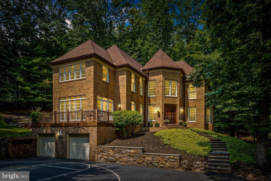 Offer deadline: Monday 7/17 at 12pm.
Rarely available custom all brick home on lushly landscaped private wooded lot in desirable Patapsco Park Estates, a community surrounded by Patapsco State Park where access to hiking & biking trails, the Patapsco River for swimming, fishing, paddling & more is right outside your door!  This stunning estate boasts 4 bedrooms / 4.5 bath and almost 5,400 sq ft, welcome home to sophisticated style at every turn with a grand two-story marble foyer, curved oak staircase and elegant millwork throughout. A phenomenal main level layout leaves nothing to be desired, full of natural light and flowing from room-to-room w/ a formal living room, sunroom (could be used as a home office with private entrance), dining room and family room that overlooks a large kitchen with breakfast bar & nook. Spacious bedrooms and oversized primary suite with sitting room and newly renovated spa like bathroom. An entertainer's dream, the fully finished lower level offers something for everyone with a spacious game room, bar area, 2 separate rec spaces (can be used a 5th bedroom, home gym or office), full bath, home theatre and solarium. Beautiful rear yard with patio overlooking peaceful waterfall and wooded landscape with play area. Furrow Avenue is a hidden gem, truly breathtaking throughout the seasons with wide tree lined streets that offer a feel of seclusion, yet is conveniently located just minutes from Rt29, I-70, I-695 & other commuter routes as well as local shopping & dining - A MUST SEE!