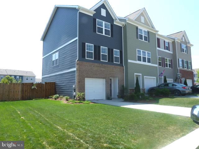 Look no further. Check out these photos and see what you think. Great home on all levels. One of the largest lots and an end unit. Practically perfect condition. 3 bedroom 2-1/2 bath. Great room on the middle main floor with lots of windows. Lower level family room open to an awesome private back and side yard. Check out the gorgeous photos of the privacy fence. Convenient to everything. Call for a showing before it is gone. You won't be disappointed. Additional Pet deposit of $200.00 and no dangerous breeds.