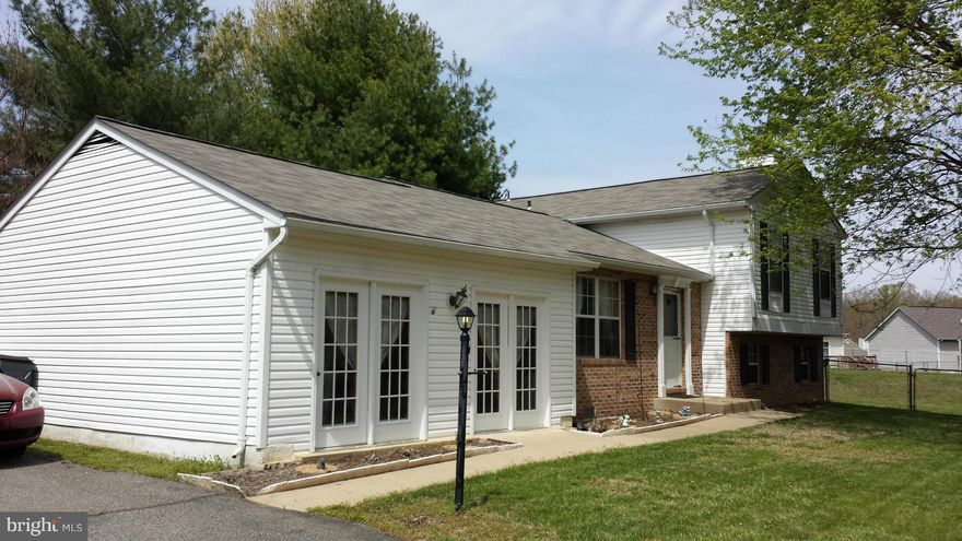 This home has a living room with doors that open fully to let in the spring breeze, a family room with a FIREPLACE, massive 400 sq. ft. rec room, vaulted ceilings, and 3 full baths, all just waiting for a new owner. Just over a 1/2 ACRE with a fenced back yard. Heating/Cooling systems, Roof, and Stainless Steel appliances are only 2 years old. Includes nice washer/dryer. ALOT FOR A LITTLE PRICE!!!