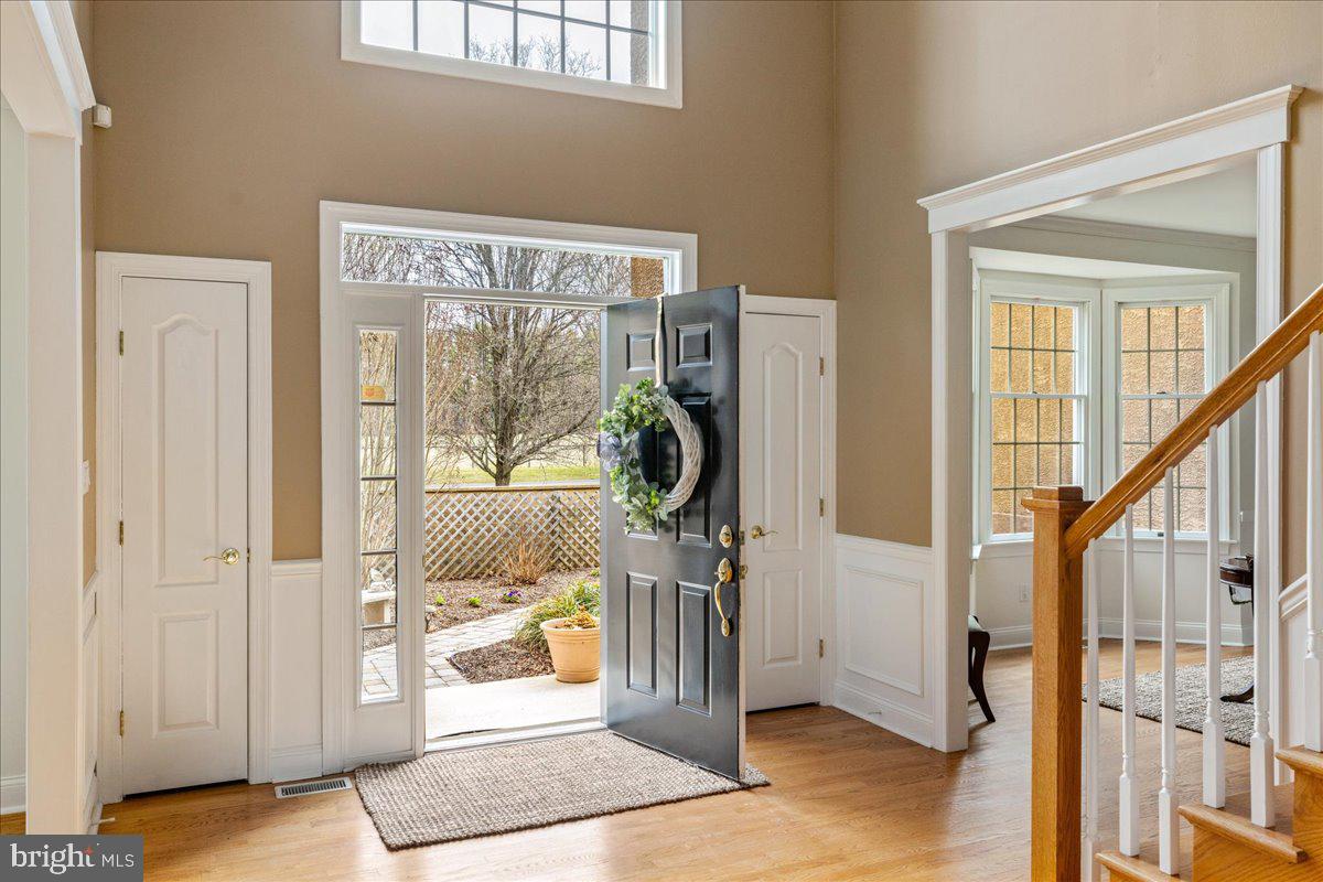 Nestled among lush, mature landscaping, this home offers an INCREDIBLE OPPORTUNITY to bring your DREAMS to LIFE! While any house can become a home, this unique lot offers endless possibilities to create a space tailored to your needs and lifestyle.
A charming paver walkway leads you to a gated courtyard entrance.
Step into a grand two-story foyer that welcomes you with elegance.
Formal living and dining rooms flank the foyer, offering space for both intimate gatherings and large celebrations.
The Family Room features a stunning floor-to-ceiling stone Gas Fireplace, Custom-Built Cabinetry, and anderson windows, adding warmth and character to the space.
The back of the house is bathed in afternoon sunlight, making the living areas feel bright and inviting.
An Open Floor plan seamlessly connects to the kitchen, perfect for casual living and entertaining.
The Custom Kitchen boasts 42" Wood Cabinets, Dimmable Led Lights, 5' Island Seating, a Coffee/Beverage bar, and a large Pantry—truly designed with function and style in mind.
The FIRST FLOOR OFFICE could be a Den or Bedroom, offering flexible space to suit your needs and lifestyle.
A convenient Laundry Room with an exterior exit, as well as a Powder Room, complete the first floor.
The THREE CAR GARAGE comes equipped with openers and keyless entry.
A back staircase leads you to the second level of the home.
Two spacious bedrooms share a full bathroom with a stall shower, double sinks, and a linen closet.
A third bedroom down the hall features a walk-in closet and an adjacent full hall bathroom.
The IMPRESSIVE PRIMARY SUITE features a vaulted ceiling, his-and-her walk-in closets, and a cozy sitting room. Need more closet space? An additional hobby room can easily be transformed into another walk-in closet. There's truly no lack of space to create what works best for you.
UPDATED PRIMARY BATHROOM includes a walk-in tiled shower w/frameless door, double vanity, towel warmer, and a soaking jetted tub, all illuminated by natural light.
FINISHED LOWER LEVEL has been freshly painted and carpeted, offering an entertainment area, powder room, exercise room, and a bar/pool room. Two large storage and utility spaces provide plenty of room to organize or expand this versatile area.
The true star of the property is the ENCHANTING BACKYARD OASIS, loved and admired by all who visit and you will too!! Imagine spending your days fishing at the pond or skating when it freezes over during the winter months.
The COVERED PATIO offers the perfect spot to relax, enjoy the view and peaceful sounds of nature.
Overlooking a serene living pond, this tranquil retreat features a Lower Patio and a walkway leading to the IN-GROUND POOL . Mature landscaping creates a private, secluded atmosphere ideal for both entertaining and quiet moments.
The EXPANSIVE SIDE YARD offers endless possibilities—create a sports court, garden your own veggies, build a She/He Shed, add a putting green, or let your imagination run wild.
Enjoy striking bursts of color with seasonal flowering trees like Crepe Myrtles, Magnolias, Maples, River Birch, and Weeping Cherry, alongside ornamental shrubs.
Spectacular sunsets, accompanied by a chorus of birds and wildlife, further enhance the peaceful ambiance. This home beautifully blends nature with timeless charm, creating a harmonious and inviting living space.
Conveniently located near Doylestown Boro, New Hope, and a variety of dining, shopping, and transportation options, making commuting to NJ, NYC, and Philadelphia a breeze.
Meticulously maintained and updated over the years, this home radiates pride of ownership.
Additional features include:
Gas-powered Generac Generator for peace of mind
Trane HVAC system (installed in 2020)
Updated LED dimmable lighting in the kitchen and basement (2024)
Newer water softener system (installed in 2020)
Large Storage Shed (20' x 14')
This HOME is not just a place to live—it’s a LIFESTYLE !!