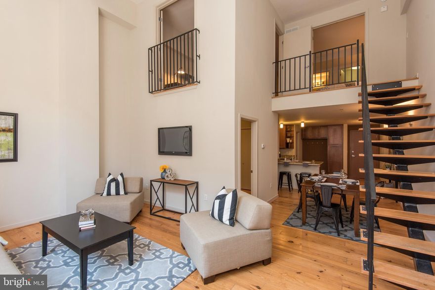 Welcome to this stunning two bedroom + den bi-level apartment in Washington Square West! Enter into a lovely foyer with a hall tree and full bathroom. This open concept kitchen / dining space is complete with granite countertops and stainless steel appliances. Please enjoy the spacious sun filled living room, bonus room, and in-unit laundry all on the first level. Upstairs you'll find two bedrooms with beautiful french doors, ample closet space, and a jack + jill bathroom.

This unit offers large windows, central air/heat, and in-unit laundry. Please enjoy the easy access to an Amazon Hub Locker in the lobby! Access to Walnut + Chestnut street shops and restaurants right outside your door. Within walking distance to CVS, Target, Washington Square Park, and Jefferson / Pennsylvania Hospitals.

***All square footage is an estimate. PLMG is not responsible for any discrepancies regarding estimated square footage that is provided by public sources, assessors, agents, advertisements or any other source.*