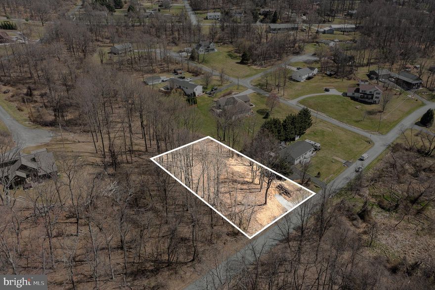 **Seller financing now available! Call for details**

Move to the country and build your dream in scenic Carroll Valley. This 0.52-acre lot comes with key improvements already in place, driveway installed, perc-approved septic, and a completed septic design for a 3BR/2BA home. The homesite is cleared, build-ready, and offers flexibility with limited builder restrictions, prefab and tiny homes welcome.
Set among the rolling hills of Adams County, this location captures the best of peaceful rural living with easy access to modern convenience. Enjoy a quiet setting near Ski Liberty, Gettysburg, and Routes 16 & 116, surrounded by hiking, golf, and outdoor recreation.
Fairfield and Carroll Valley offer the perfect blend of small-town warmth, natural beauty, and opportunity. Whether you’re building your forever home or your next investment, this is a place where space, serenity, and simple living come naturally.