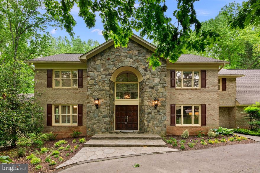 Nestled in beautiful Great Falls, 431 Olympia Way offers a rare opportunity to experience exquisite living in an idyllic setting. This stately residence boasts timeless elegance and impressive updates all set against a backdrop of lush greenery and serene landscapes on 2.6 acres.   Five bedrooms and four full baths on three levels.  The main level features a large entry foyer leading to a dramatic great room with stone fireplace, two-story ceiling, and soaring windows.   A renovated kitchen with top notch finishes, center island, table space and access to the decks overlooking the pool.  A separate dining room, a large living room, study, sunroom, a renovated full bath, laundry and garage access are also on the main level.  The upper level has the spacious primary bedroom with a beautiful primary bath that features a floating double vanity and radiant flooring,  a large walk-in closet with additional storage and a deck overlooking the pool.  Three additional spacious bedrooms and a renovated full bath are also on the upper level.  The lower level has a large rec room with fireplace, bedroom, full bath, kitchenette, and tons of storage.  Large two-car garage with plenty of driveway parking.   Private in-ground pool.  All in a lovely setting.   Schedule your private tour today.