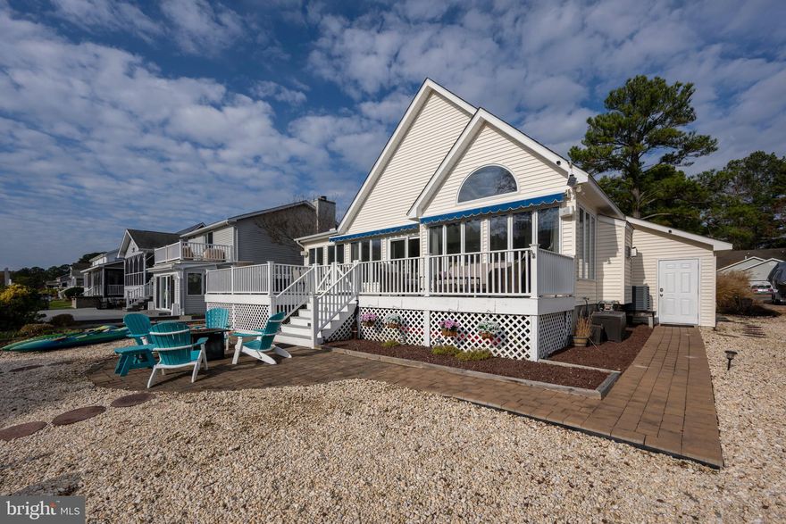 Welcome to coastal living at its finest in the heart of Ocean Pines, MD!
This beautifully maintained 3-bedroom, 3-bath single-family home offers the perfect balance of comfort, charm, and coastal convenience—ideal as a full-time residence, vacation getaway, or investment property.

Just minutes from amenities, this home features an inviting open-concept layout with abundant natural light, vaulted ceilings, and a seamless flow perfect for entertaining. The spacious living area opens to a bright kitchen with ample counter space and a dining area overlooking a serene view of the canal and maybe your new boat!

The home features two spacious primary suites, providing exceptional flexibility for residents and guests. The upper-level suite offers added privacy and serves as a peaceful retreat with its own ensuite bath.
Boating enthusiasts will appreciate the deeded boat slip with a lift, offering convenient access to the water just steps from the home.

Additional highlights include a sun-filled living area, well-designed kitchen and dining spaces, and a tranquil outdoor setting ideal for relaxing or entertaining. Enjoy the amenities of Ocean Pines, including golf, pools, yacht club, marina, and walking trails.

This property offers an elegant blend of lifestyle and location—perfect for those seeking a coastal retreat with exceptional water access.